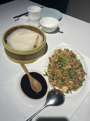 the dish with wrappers   at Huā Kāi SùShí 花开素食 - Dongcheng in Beijing