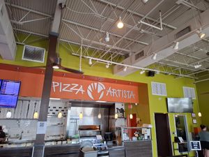 Inside, not very vegan friendly... could have suggested tom make our own pizza... at Pizza Artista in Lafayette