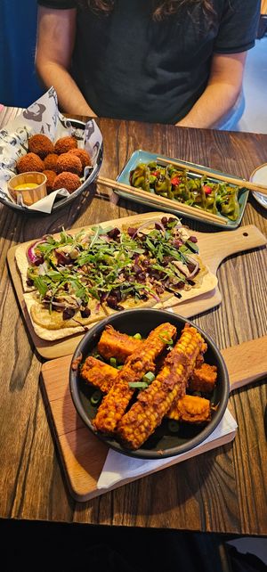 Bitterballen (€9,50) dumplings (€10,50) Flammkuchen bieten (€12,50) en corn ribs (€9) at Rebel Rebel in Dordrecht