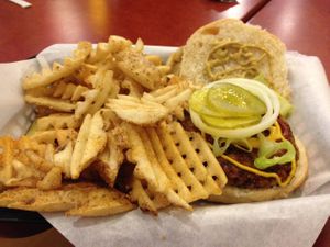 Vegan burger and a mixture of Cajun & Garlic waffle fries at Lucky's in Scottsdale