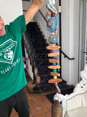 Essential vegan restaurant wind chime. “Breathe, Balance, Abundance, Bliss, Joy, Gratitude.” at Plant Theory in Miami