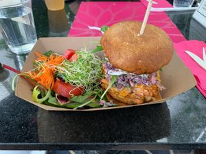 Guava BBQ Jackfruit sandwich with a salad at Plant Theory in Miami