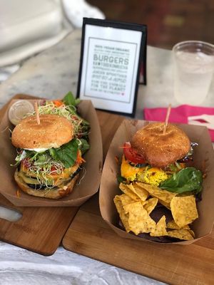 Burgers with choice of salad or tortilla chips at Plant Theory in Miami