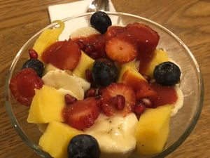 Home made cashew yoghurt with fresh fruit and strawberry sauce  at Yi in Athens