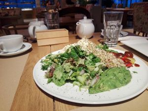 Green salad with avocado, alfalfa roots, onion, cherry tomatoes etc.

Amazing salad! at Yi in Athens