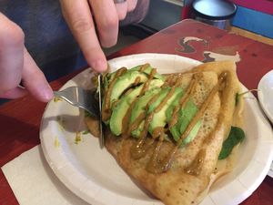 Vegan savoury crepe (filling: mushroom, spinach, vegan cheese, pesto & hummus, topped with avocado)  at Eldur og Is - Fire and Ice in Reykjavik