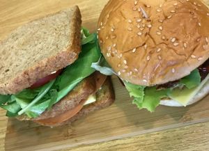 Club sandwich and vegan burger at Mennyorszag Szive in Budapest