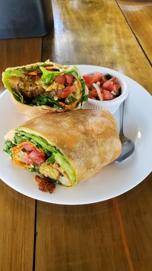 Falafel wrap (missing one bite!). at Urban Farm Cafe in San Isidro De El General