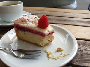 Get this! Raspberry cheesecake topped with white chocolate ganache at Cafe Neundrei in Berlin