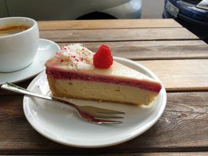Get this! Raspberry cheesecake topped with white chocolate ganache at Cafe Neundrei in Berlin