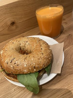 Mushroom bagel and juice   at Cafe Neundrei in Berlin