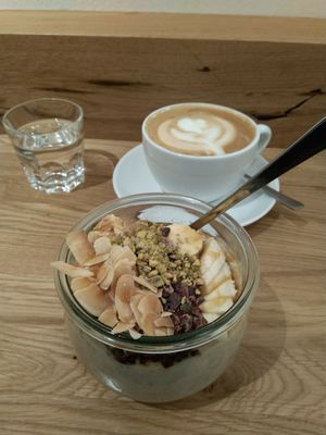 Banana-marple sirup porridge with plenty of nuts at Cafe Neundrei in Berlin