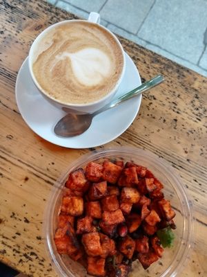 delicious sweet potatoes-lenti salad and a soy cappuccino   at Cafe Neundrei in Berlin