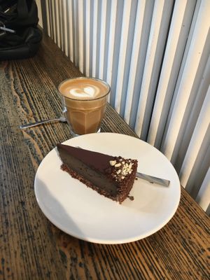 another coffee with oat milk and cake at Cafe Neundrei in Berlin