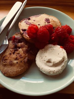 Blueberry soulcakes with vanilla ice cream and raspberries at Wild Thyme Wholefoods in Portsmouth