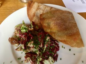 Vegetarian kind of pita bread/wrap with pumpkin, cheddar, courgette and more. I definitely recommend this dish! at Olive in Innsbruck