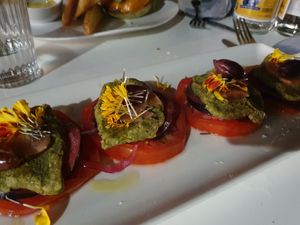 Ensalada caprese con queso de almendra y berenjena encurtida at Baobab in Zaragoza