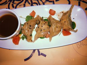 Vegan dumplings with pulled jackfruit and an orange vinaigrette  at Baobab in Zaragoza