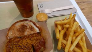 Currywurst meal with iced tea at VINCENT - Europa Passage in Hamburg