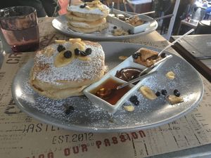 Vegan pancakes with chocolate, maple syrup and peanut butter. at Crop in Crete