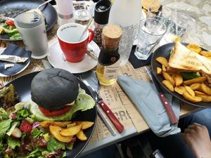 Vegan Burger (left) opted with salad instead of fries at Crop in Crete