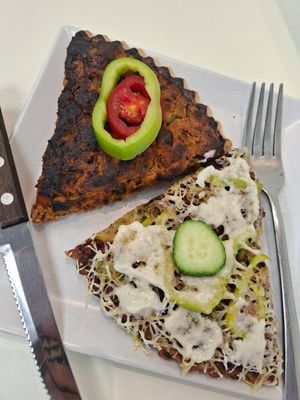 Quiche (second type) and pizza with vegan sausage at Loving Hut in Sofia