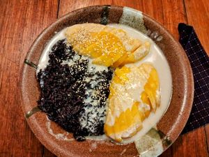 Mango with Black Sticky Rice and Salted Coconut Cream at Deva in Kampot