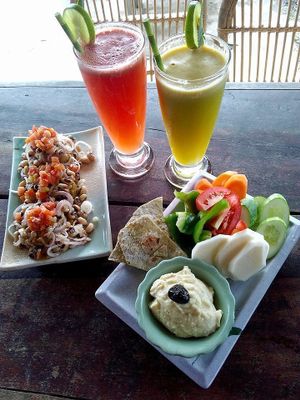 All Vegan; White Bean Papas, Hummus and Veggies, Homemade Morning Glory Brown Rice Flatbread with Exotic Fresh Juices! at Deva in Kampot