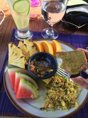 One of the great vegan breakfasts here- tofu scrumbles, tomato salsa, walnut bread with vegan cheese, avocado and fruits! at Deva in Kampot