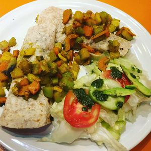 Bean burritos in flour tortillas with mixed veg and salad with homemade pesto at Delicias Naturales in San Cristobal De Las Casas