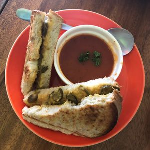 Jalapeño and cheese sandwich served with tomato soup at The Kismet Cafe in Makati