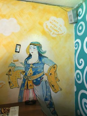 Funny murals  at The Kismet Cafe in Makati