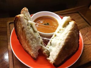 Jalapeño Grilled Cheese:  We serve our sandwiches with a side of tomato soup! at The Kismet Cafe in Makati