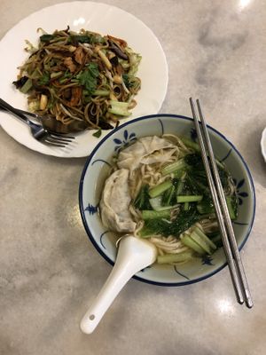 Noodle soup with dumpling and fried noodles with some veggies.  at Yun Shan Ge Vegetarian House - Penang St in Penang