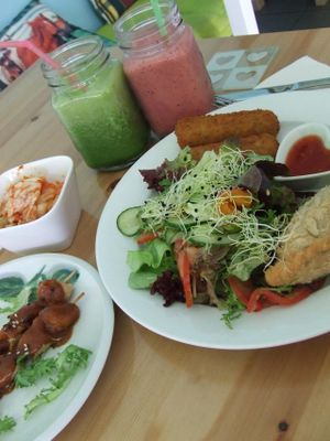 Green and fruit smoothie, sateh and more at Loving Hut in Amsterdam