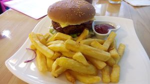 Burger with fries  at Loving Hut in Amsterdam