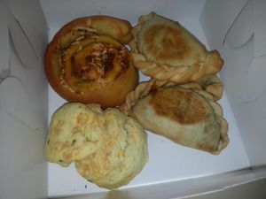pizza roll, biscuit and empanadas  at Parlour Vegan Bakery in Plantation