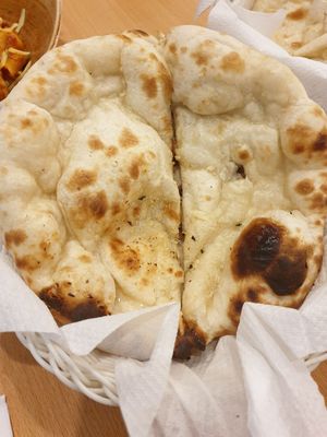 Garlic Naan $4.50, Plain Naan $4.00 at Green Mushroom in Newtown