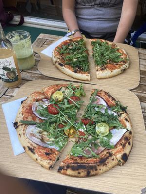 Funghi and eggplant vegan pizza with juice  at Unter Freunden in Heidelberg