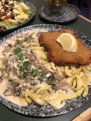 Schnitzel with Swabian Spätzle and mushroom cream   at Cafe Rost in Mannheim