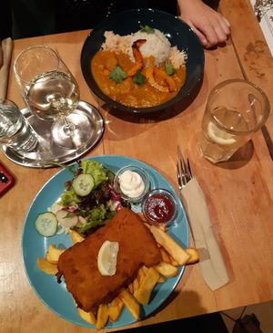 Pumpkin curry (dish of the day) and vegan schnitzel with fries and salad at Cafe Rost in Mannheim