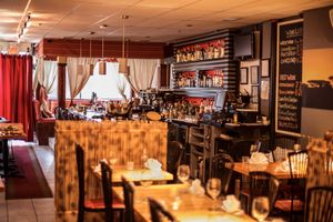 Our tables and bar seen in the afternoon. The "front tent" seating area seen by the window can include 10 friends at Selam in Toronto