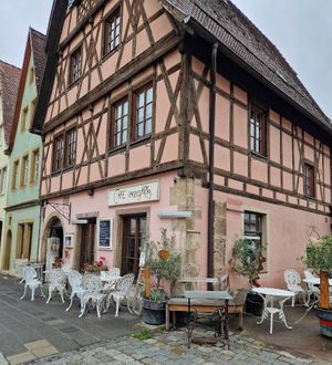 Outdoor seating at Cafe Einzigartig in Rothenburg Ob Der Tauber