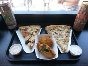 Veggielicious special! 2 pizza slices (BBQ Buffalobotomy, Pig Destroyer Destroyer), 2 jalapeno poppers, 2 dipping sauces (creamy garlic, creamy chipotle), 2 Arizona cans, and 2 soft serve cones (not pictured). ALL SO DELICIOUS. at Apiecalypse Now Pizza and Snack Bar in Toronto