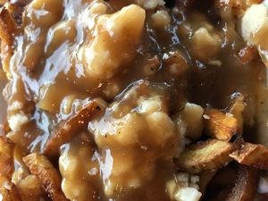 Poutine at Apiecalypse Now Pizza and Snack Bar in Toronto