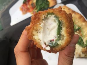 Jalapeño popper (very spicy!) at Apiecalypse Now Pizza and Snack Bar in Toronto