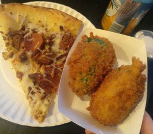 Pig Destroyer Destroyer pizza and jalapeno poppers at Apiecalypse Now Pizza and Snack Bar in Toronto
