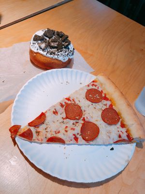 ”Pepperoni” pizza and a cookies n cream donut at Apiecalypse Now Pizza and Snack Bar in Toronto