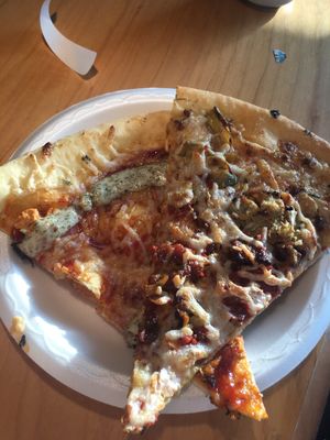 Pig destroyer destroyer and the buffalo chickpea pizza at Apiecalypse Now Pizza and Snack Bar in Toronto
