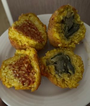 Both arancini cut in half, portions are generous.  at Mondo Arancina in Rome